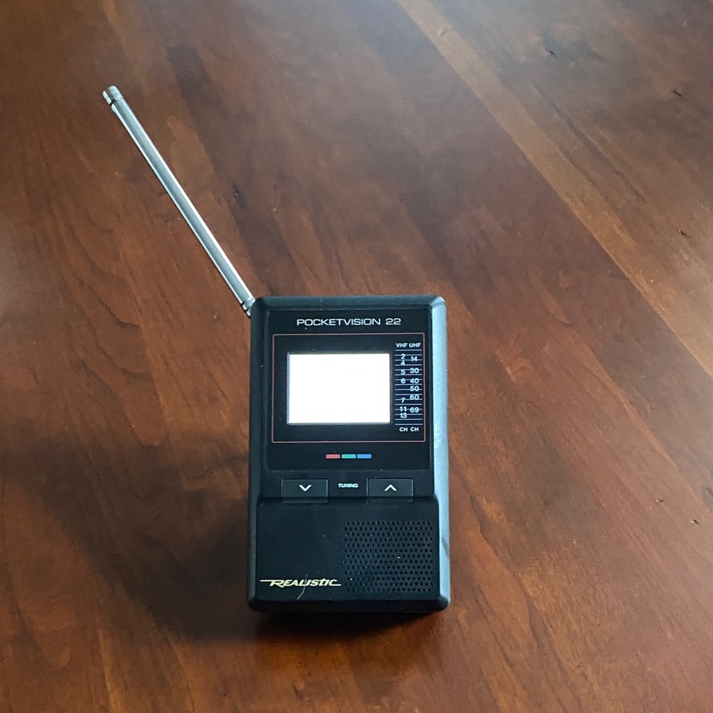Pocketvision analog color TV. 2” screen. Works well.